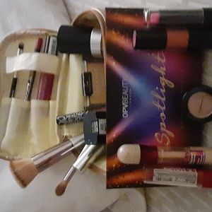 I'm makeup with a makeup bag a purse and Foundation that has not been used
